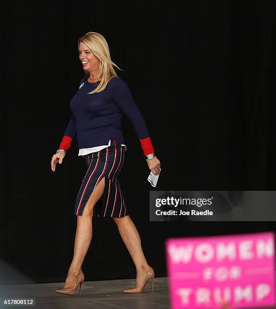 Florida Attorney General Pam Bondi walks on stage to speak before the arrival of Republican presidential candidate Donald Trump during his campaign...