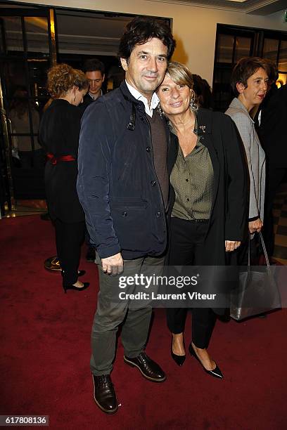 Bruno Madinier and his wife Camille attend "L'Heureux Elu" theater play premiere at Theatre de La Madeleine on October 24, 2016 in Paris, France.