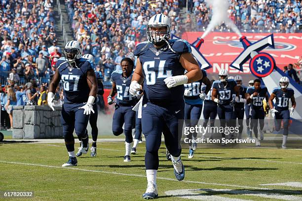 Tennessee Titans Offensive Guard Josh Kline runs onto the field prior to the NFL week 7 game between the Indianapolis Colts and the Tennessee Titans...