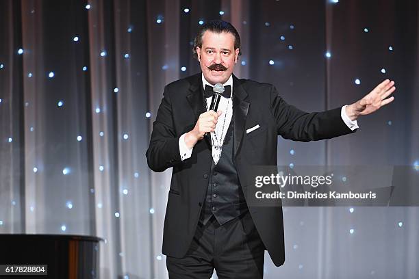 Auctioneer Nicholas Lowry speaks onstage during the 2016 Princess Grace Awards Gala with presenting sponsor Christian Dior Couture at Cipriani 25...