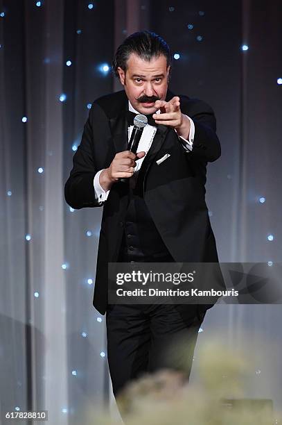 Auctioneer Nicholas Lowry speaks onstage during the 2016 Princess Grace Awards Gala with presenting sponsor Christian Dior Couture at Cipriani 25...