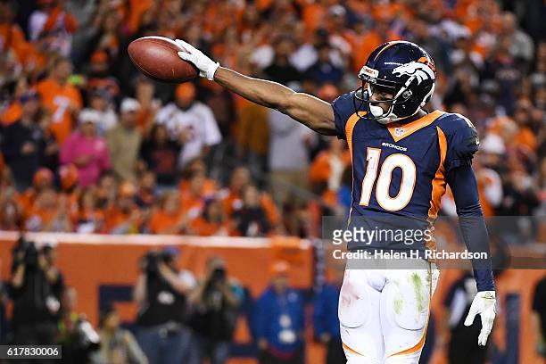 Emmanuel Sanders of the Denver Broncos celebrates a first-down reception against the Houston Texans during the fourth quarter on Monday, October 24,...