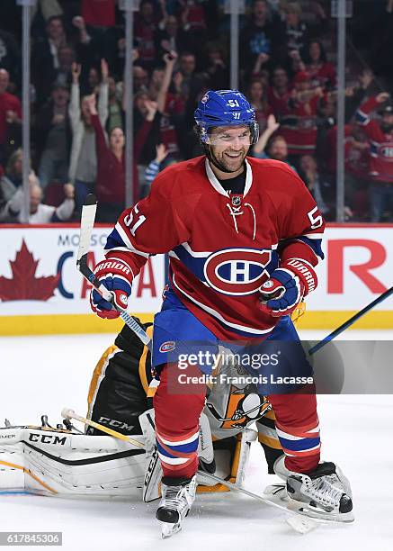 David Desharnais the Montreal Canadiens celebrates after scoring a goal against Marc-Andre Fleury of the Pittsburgh Penguins in the NHL game at the...