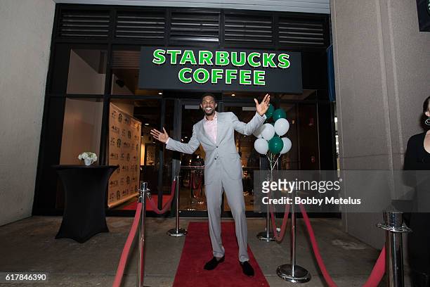 Miami, FL Miami Heat's Udonis Haslem stands in front of his new Starbucks location at the VIP preview of Starbucks hosted by Udonis Haslem and Ramona...