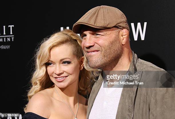 Randy Couture and Mandy Robinson arrive at the Los Angeles premiere of "Hacksaw Ridge" held at Samuel Goldwyn Theater on October 24, 2016 in Beverly...
