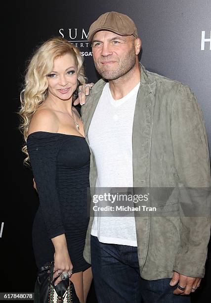 Randy Couture and Mandy Robinson arrive at the Los Angeles premiere of "Hacksaw Ridge" held at Samuel Goldwyn Theater on October 24, 2016 in Beverly...