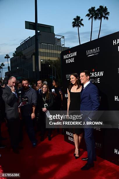Actor James Mackay and guest pose on arrival for the special screening of the film 'Hacksaw Ridge' at the Samuel Goldwyn Theater in Beverly Hills,...