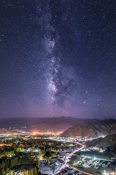 milky way over leh city in leh ladakh, india. - laddakh stock pictures, royalty-free photos & images