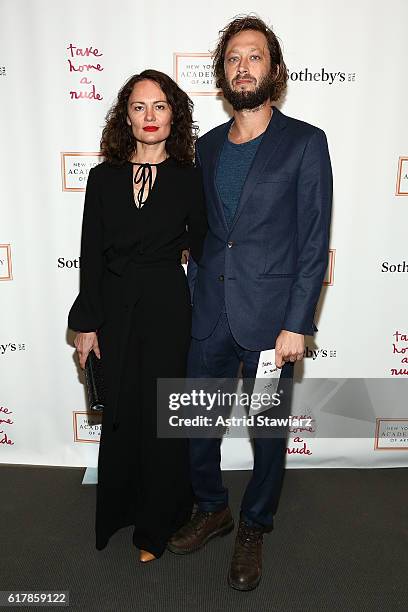 Yelena Yemchuk and Ebon Moss-Bachrach attends Take Home A Nude Benefiting New York Academy Of Art at Sotheby's on October 24, 2016 in New York City.