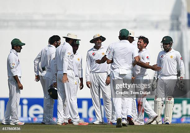 Yasir Shah of Pakistan celebrates taking the wicket of Roston Chase of West Indies during Day Five of the Second Test between Pakistan and West...