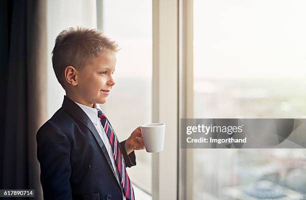 portrait of a cute little business man - teenager dream work stock pictures, royalty-free photos & images