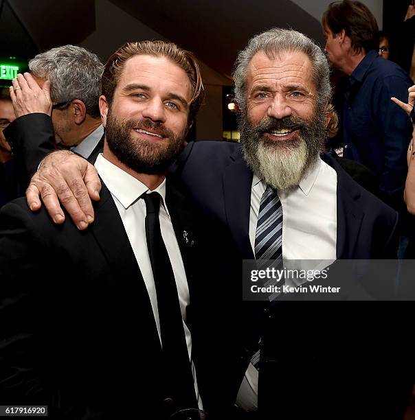 Director Mel Gibson and his son actor Milo Gibson pose at the after party for a screening of Summit Entertainment's "Hacksaw Ridge" at the Academy of...