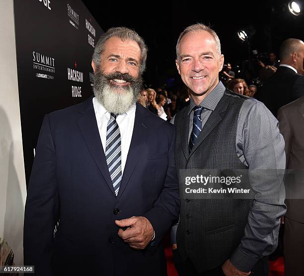 Director Mel Gibson and executive producer David Greathouse arrive at the screening of Summit Entertainment's "Hacksaw Ridge" at the Samuel Goldwyn...