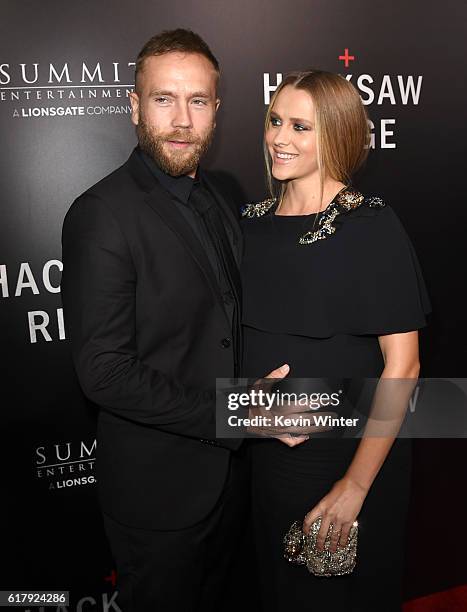 Mark Webber and actress Teresa Palmer arrive at the screening of Summit Entertainment's "Hacksaw Ridge" at the Samuel Goldwyn Theater on October 24,...