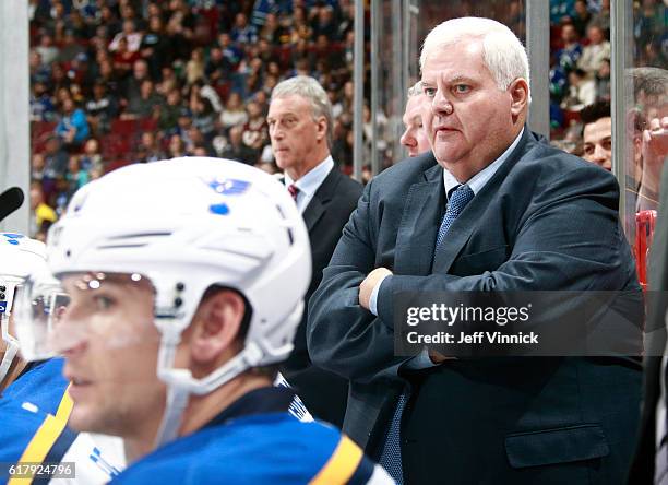 Head coach Ken Hitchcock of the St. Louis Blues looks on from the bench during their NHL game against the Vancouver Canucks at Rogers Arena October...