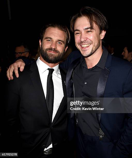 Actors Milo Gibson and Ben O'Toole arrive at the screening of Summit Entertainment's "Hacksaw Ridge" at the Samuel Goldwyn Theater on October 24,...