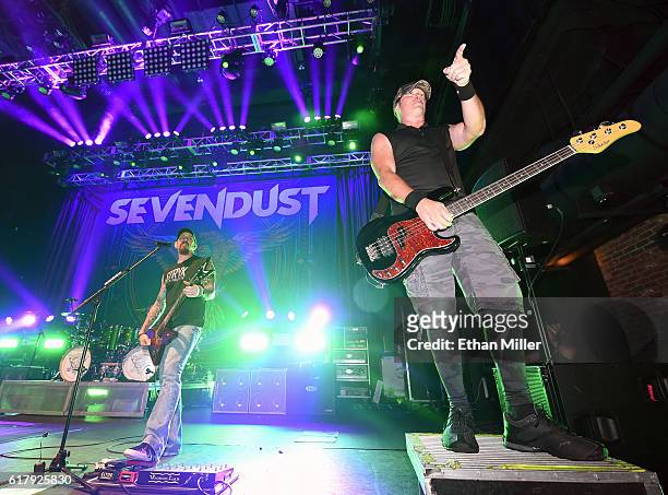 Guitarist John Connolly and bassist Vince Hornsby of Sevendust perform during a stop of the band's Kill the Flaw tour at Brooklyn Bowl Las Vegas at...