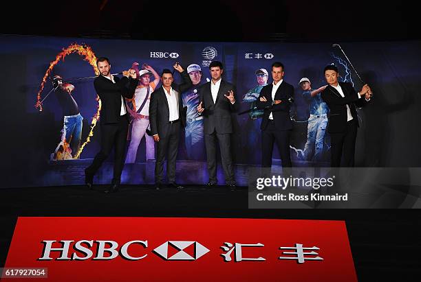 Golfers Dustin Johnson, Rickie Fowler and Bubba Watson of the United States, Henrik Stenson of Sweden and Haotong Li of China pose on stage at the...