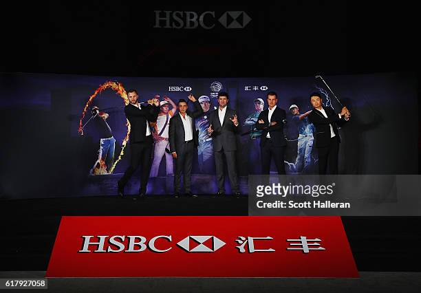 Golfers Dustin Johnson, Rickie Fowler and Bubba Watson of the United States, Henrik Stenson of Sweden and Haotong Li of China pose on stage at the...