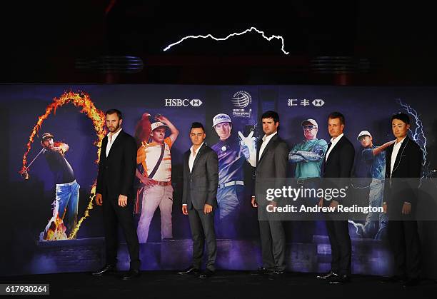 Golfers Dustin Johnson, Rickie Fowler and Bubba Watson of the United States, Henrik Stenson of Sweden and Haotong Li of China pose on stage at the...