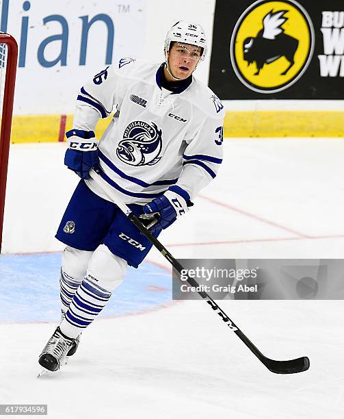 Austin Osmanski of the Mississauga Steelheads turns up ice against the Niagara IceDogs during game action on October 21, 2016 at Hershey Centre in...