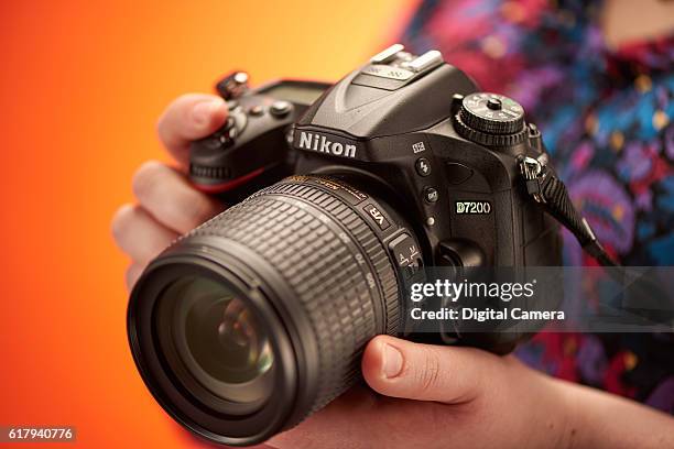 Detail of a photographer holding a Nikon D7200 DSLR camera, taken on... News Photo - Getty Images Detail of a photographer holding a Nikon D7200 DSLR camera, taken on... News Photo - Getty Images