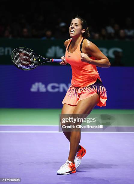 Madison Keys of the United States celebrates victory in her singles match against Dominika Cibulkova of Slovakia during day 3 of the BNP Paribas WTA...