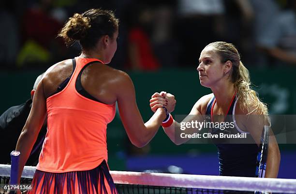 Dominika Cibulkova of Slovakia congratulates Madison Keys of the United States after their singles match during day 3 of the BNP Paribas WTA Finals...