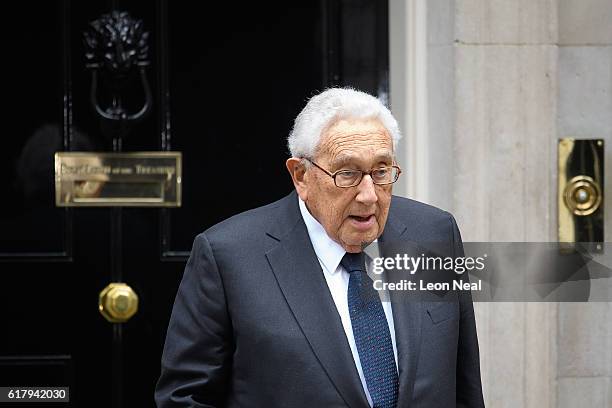 Former US Diplomat Henry Kissinger leaves following a meeting with British Prime Minister Theresa May at 10 Downing Street on October 25, 2016 in...