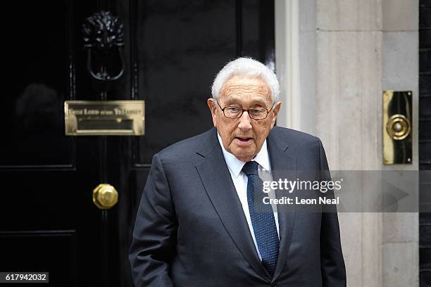 Former US Diplomat Henry Kissinger leaves following a meeting with British Prime Minister Theresa May at 10 Downing Street on October 25, 2016 in...