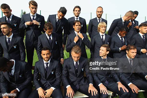 Lazio head coach Simone Inzaghi with his players pose for photographs wearing the official uniform during the SS Lazio training session at Formello...