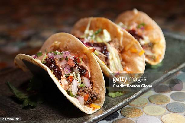 Los Fundamentos Beef Tacos, Lettuce, Pic De Gailo, House Blend Cheese, Ancho and Taco sauce, choice of crisp corn, corn masa, flour at Scorpion Bar...