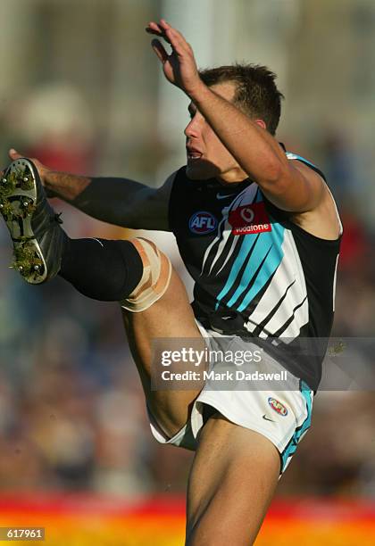 Warren Tredrea for Port kicks one of his goals during the Round 10 Hawthorn Hawks versus the Port Adelaide Power AFL match, played at York Park,...