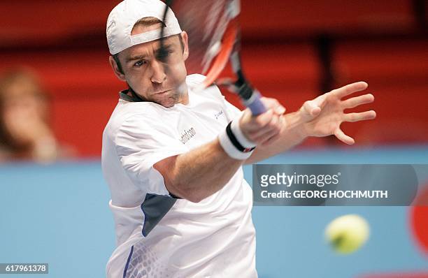 Benjamin Becker of Germany returns the ball to Jo-Wilfried Tsonga of France during his match at the Erste Bank Open ATP tennis tournament in Vienna,...