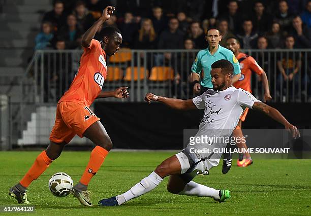 Laval's forward Alassane N'Diaye vies for the ball during the third round French League Cup football match between Stade Lavallos and Montpellier...