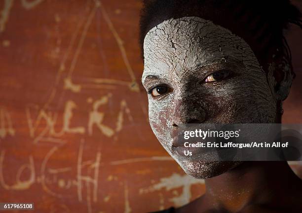 Woman with muciro face mask, ibo island, Mozambique on July 20, 2013 in Ibo Island, Mozambique.