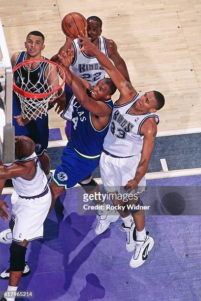 Popeye Jones of the Dallas Mavericks shoots against the Sacramento Kings circa 1997 at Arco Arena in Sacramento, California. NOTE TO USER: User...