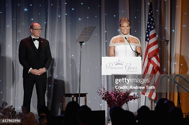 His Serene Highness Prince Albert II of Monaco and Queen Latifah speak onstage during the 2016 Princess Grace Awards Gala with presenting sponsor...
