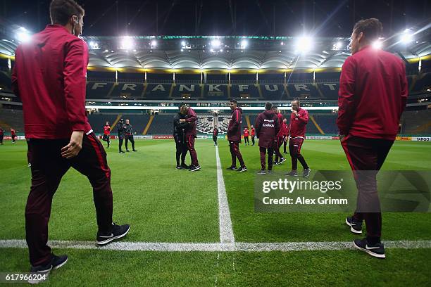 Players walk on to the pitch prior to the DFB Cup Second Round match between Eintracht Frankfurt and FC Ingolstadt at Commerzbank-Arena on October...