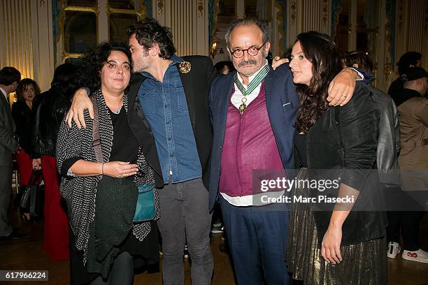 Emilie Chedid, Matthieu Chedid, Louis Chedid and Anna Chedid pose after Louis Chedid ceremony receiving medal of 'Commander of the Order of Arts and...