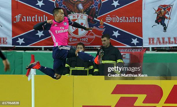 Bobby Wood of Hamburg jubilates after scoring the first goal during the DFB Cup second round match between Hallescher FC and Hamburger SV at...