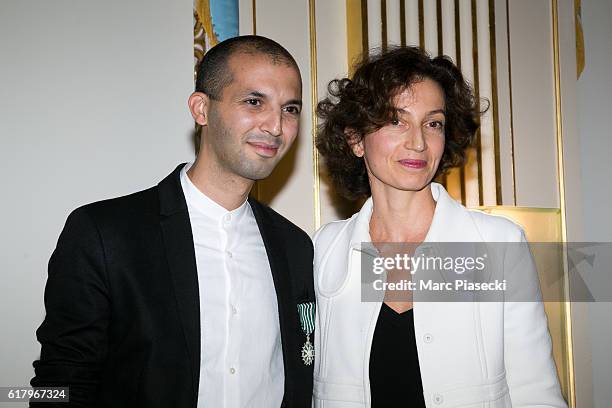 Musician Issam Krimi receives the medal of 'Officer of the Order of Arts and Letters' from Minister of Culture and Communication Audrey Azoulay at...
