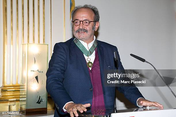Musician Louis Chedid receives the medal of 'Commander of the Order of Arts and Letters' at Ministere de la Culture from Minister of Culture and...