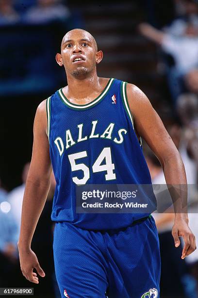 Popeye Jones of the Dallas Mavericks walks against the Sacramento Kings circa 1997 at Arco Arena in Sacramento, California. NOTE TO USER: User...