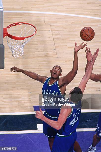 Popeye Jones of the Dallas Mavericks rebounds against the Sacramento Kings circa 1997 at Arco Arena in Sacramento, California. NOTE TO USER: User...