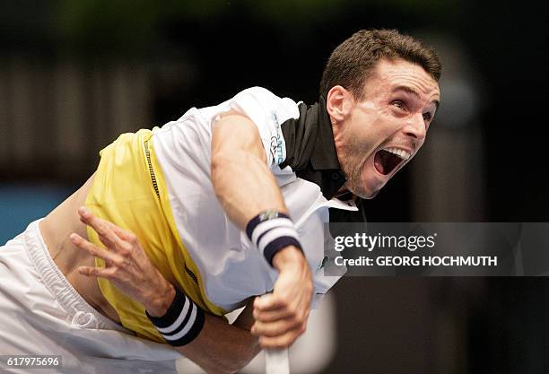 Spain's Roberto Bautista Agut serves the ball to Austria's Juergen Melzer during his match at the Erste Bank Open ATP tennis tournament in Vienna,...