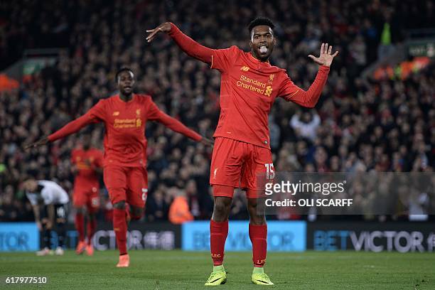 Liverpool's English striker Daniel Sturridge celebrates after scoring their second goal during the EFL Cup fourth round match between Liverpool and...