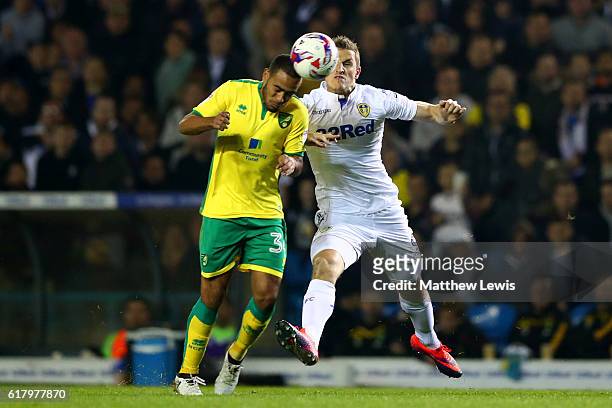 Martin Olsson of Norwich City and Chris Wood of Leeds United battle for possession during the EFL Cup fourth round match between Leeds United and...