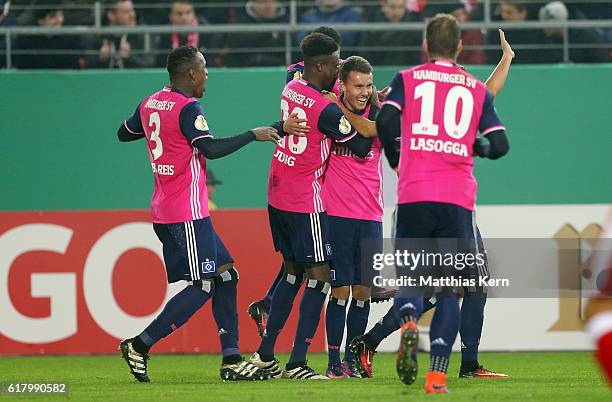 Luca Waldschmidt of Hamburg jubilates with team mates after scoring the fourth goal during the DFB Cup second round match between Hallescher FC and...