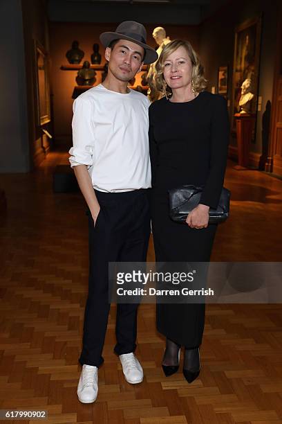 Han Chong and Sarah Mower attend the Self-Portrait Dinner at The National Portrait Gallery on October 25, 2016 in London, England.